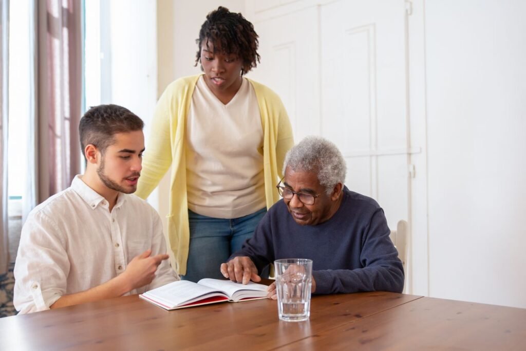 An older adults taking part in an inclusive activity with support from diverse care workers